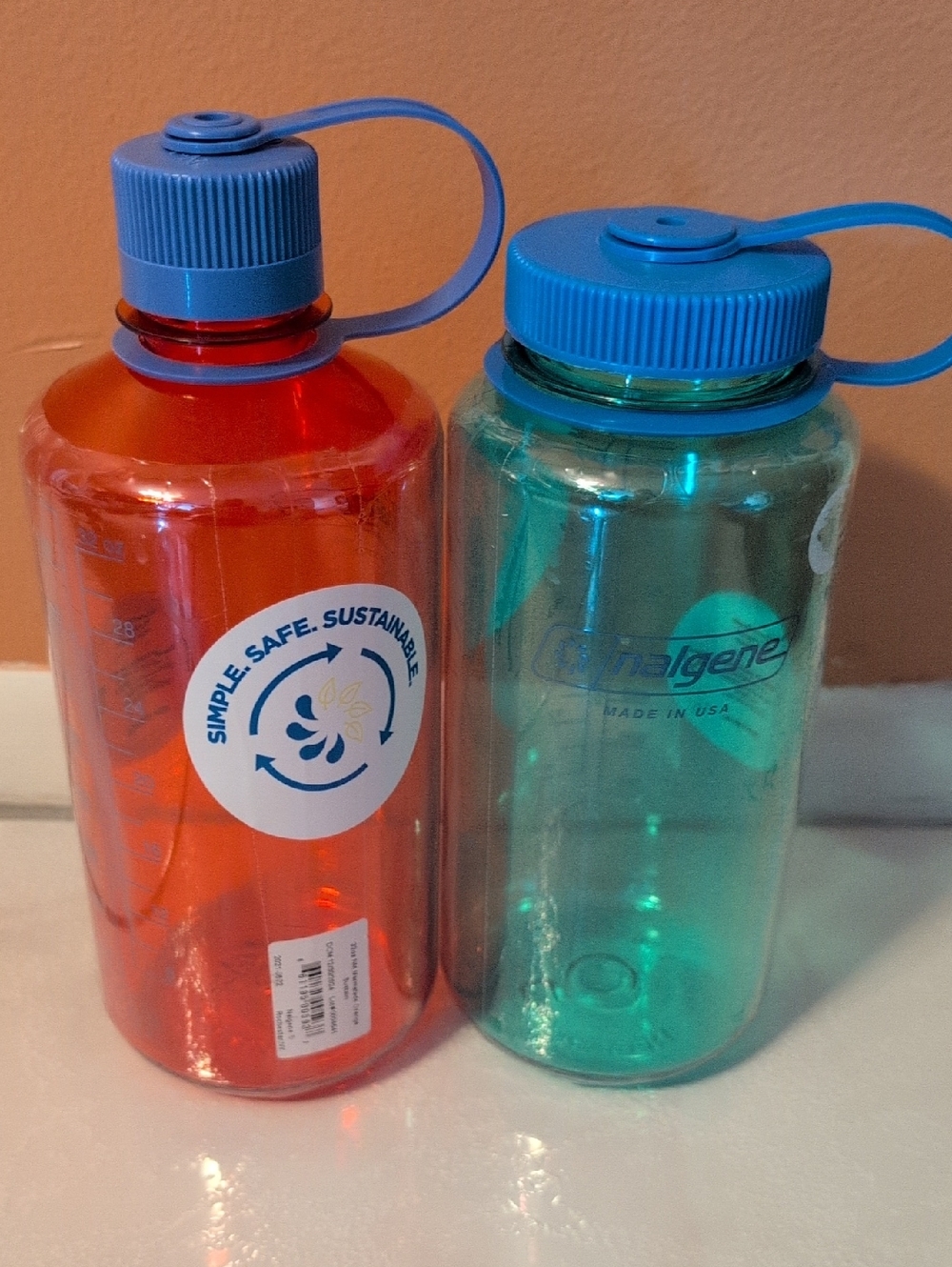 Nalgene Orange and Green Water Bottles